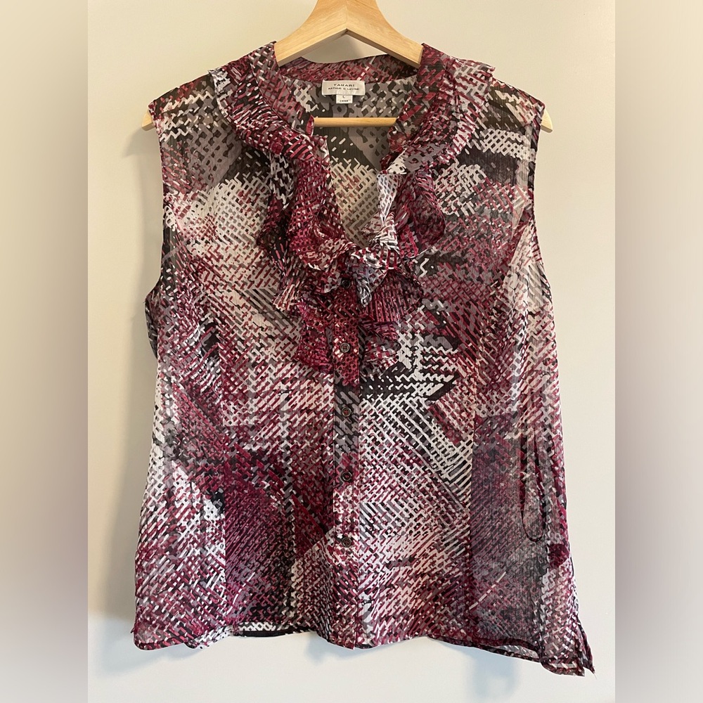 Tahari sleeveless top. Ruffles & Sheer fabric, need top underneath. Size L.
